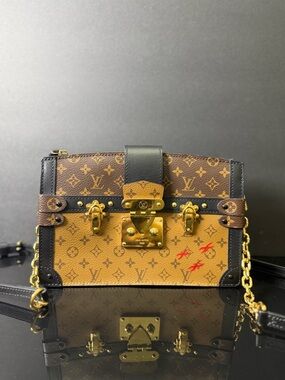 Authentic Louis Vuitton Reverse Monogram Trunk Clutch